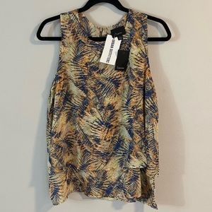 Urban Outfitters Lumiere Sleeveless Top size Large. New with tag